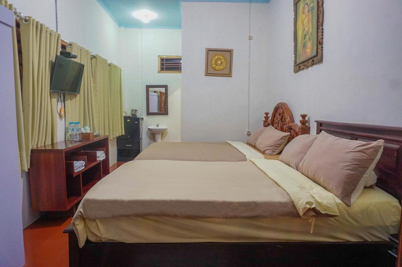 The Wisma Pulau Merah Pasanggaran Esterno foto